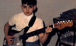 Jimmy Hotz playing Guitar at a very young age